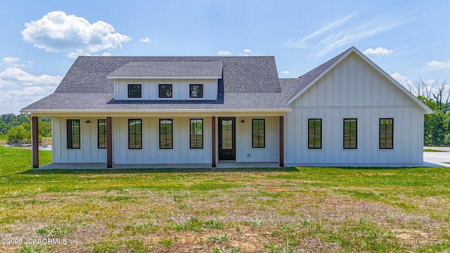 5306 Tebbetts View Dr, Tebbetts, MO 65080 - modern farmhouse featuring board and batten siding, roof with shingles, covered porch, and a front yard