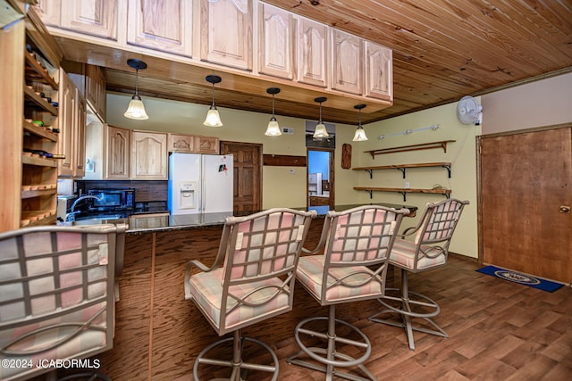 kitchen featuring a kitchen bar, dark wood-type flooring, wooden ceiling, hanging light fixtures, and white fridge with ice dispenser