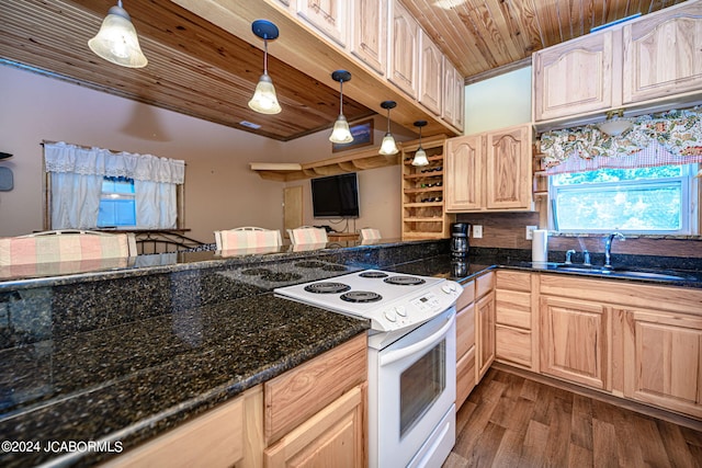 kitchen with electric range, light brown cabinets, wooden ceiling, and sink