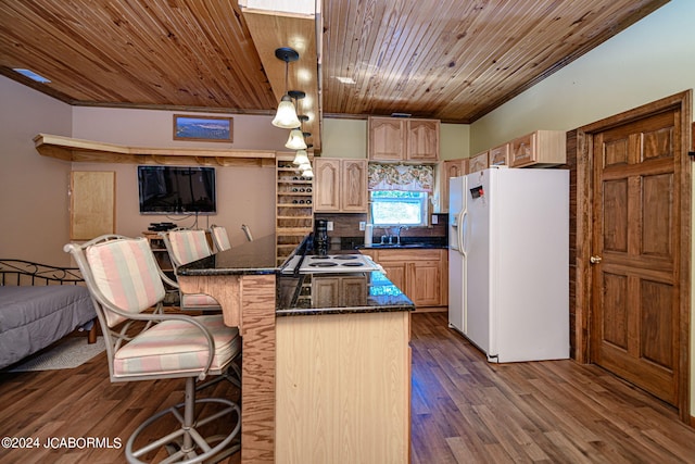 kitchen with dark hardwood / wood-style flooring, sink, white appliances, and ornamental molding