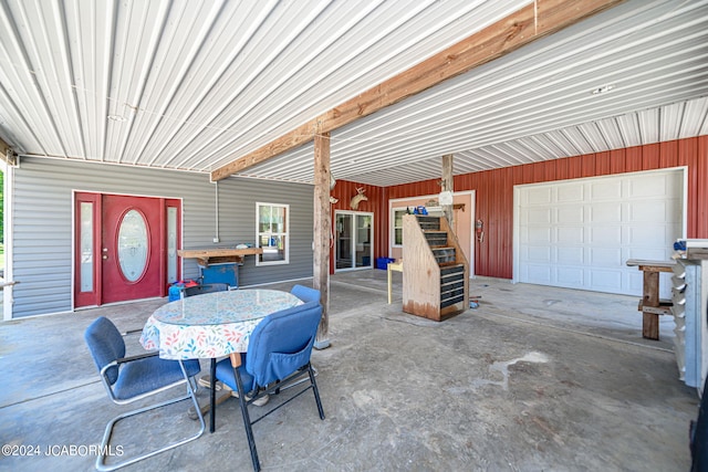 view of patio / terrace featuring a garage