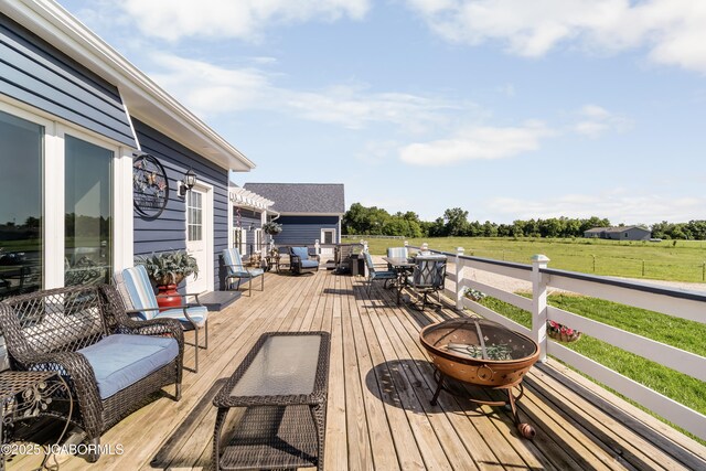 6733 Rocking Horse Ln, Fulton, MO 65251 - wooden terrace featuring a lawn, an outdoor hangout area, a view of countryside, and outdoor dining area