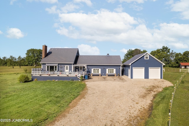 6733 Rocking Horse Ln, Fulton, MO 65251 - view of front facade with an outdoor structure, a chimney, dirt driveway, and a front yard