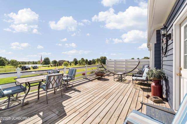 6733 Rocking Horse Ln, Fulton, MO 65251 - wooden terrace with outdoor dining space, a fire pit, and a water view
