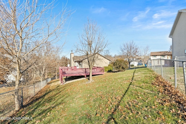 view of yard with a deck