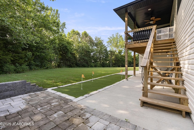 1330 Summerfield Dr, Jefferson City, MO 65109 - view of patio featuring stairway, a putting area, a ceiling fan, and a wooden deck