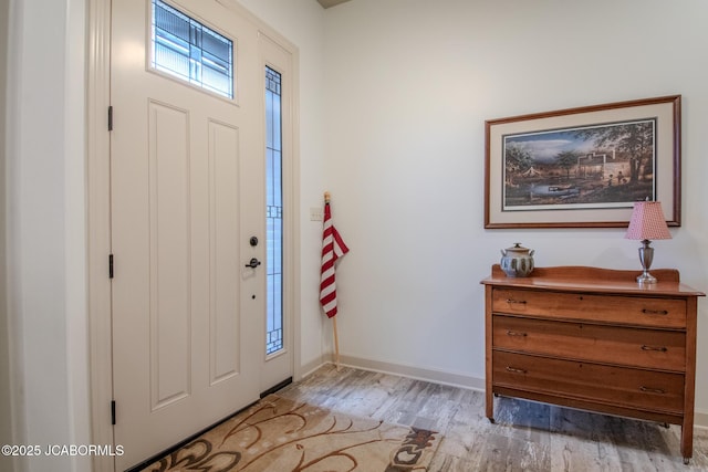 foyer featuring wood-type flooring