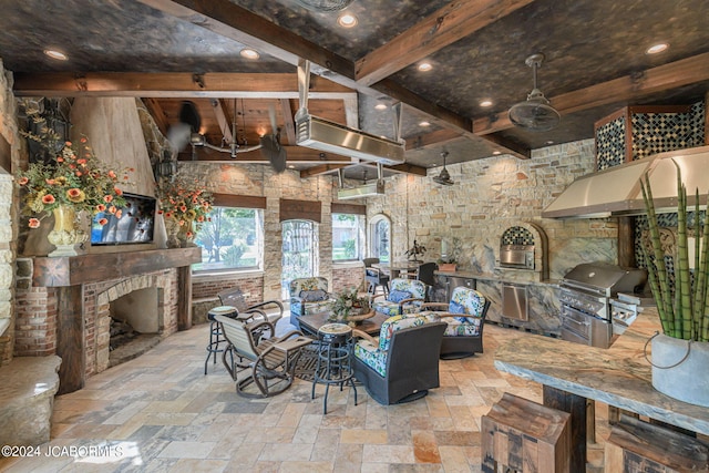 living room featuring beam ceiling