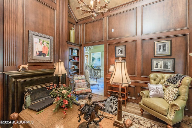 sitting room featuring a notable chandelier