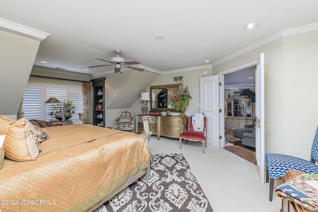 carpeted bedroom with lofted ceiling, ceiling fan, and crown molding