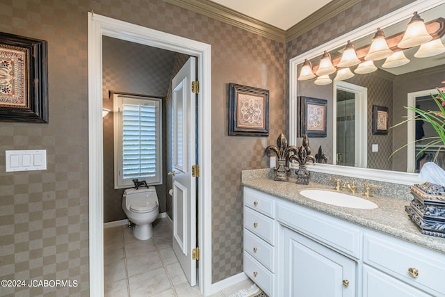 bathroom with tile patterned flooring, vanity, toilet, and ornamental molding