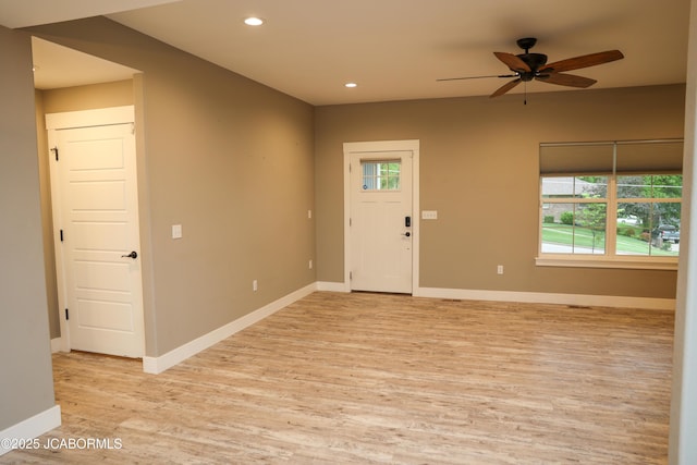 foyer with recessed lighting, ceiling fan, a healthy amount of sunlight, and light wood finished floors