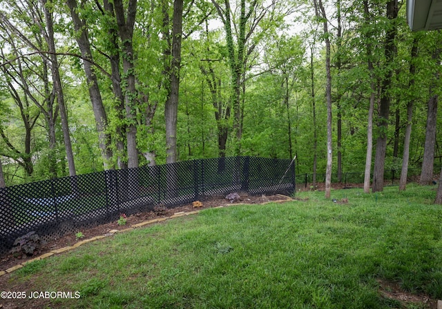 view of yard with fence