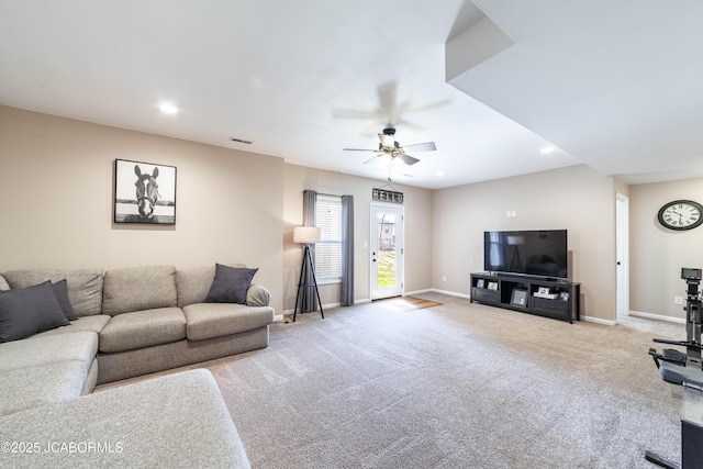 carpeted living room featuring visible vents, recessed lighting, a ceiling fan, and baseboards