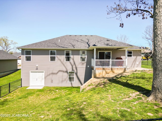 5405 Kenview Dr, Jefferson City, MO 65109 - rear view of house with a yard and fence