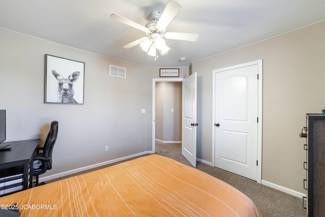 carpeted bedroom with a ceiling fan, baseboards, and visible vents