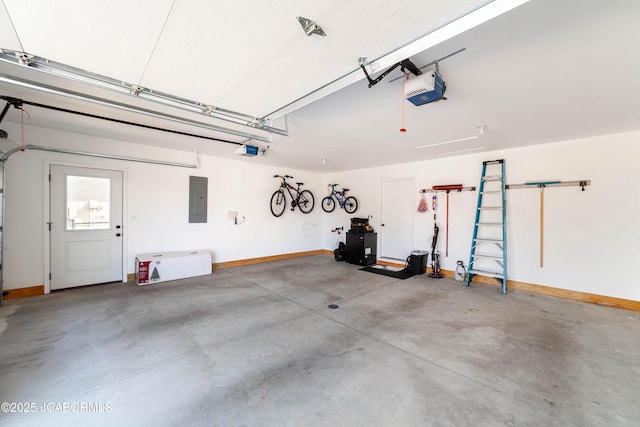 garage with electric panel, baseboards, and a garage door opener