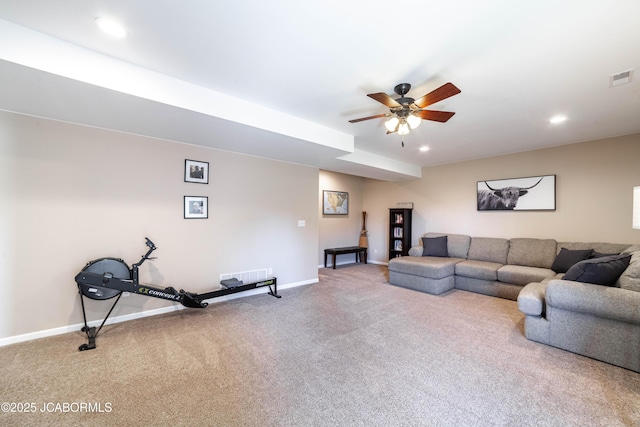 living area featuring carpet, a ceiling fan, visible vents, baseboards, and recessed lighting