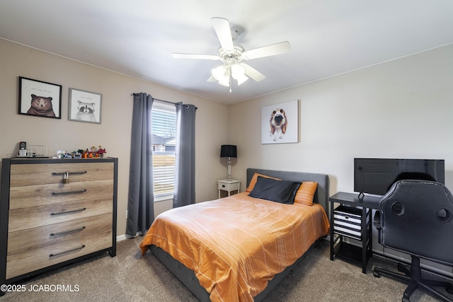 bedroom with baseboards, carpet floors, and a ceiling fan