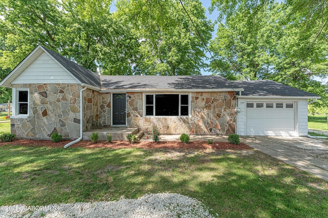 115 Middle St, Moberly, MO 65270 - ranch-style home featuring stone siding, a garage, a front lawn, and driveway