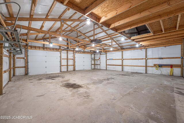 115 Middle St, Moberly, MO 65270 - garage featuring a garage door opener