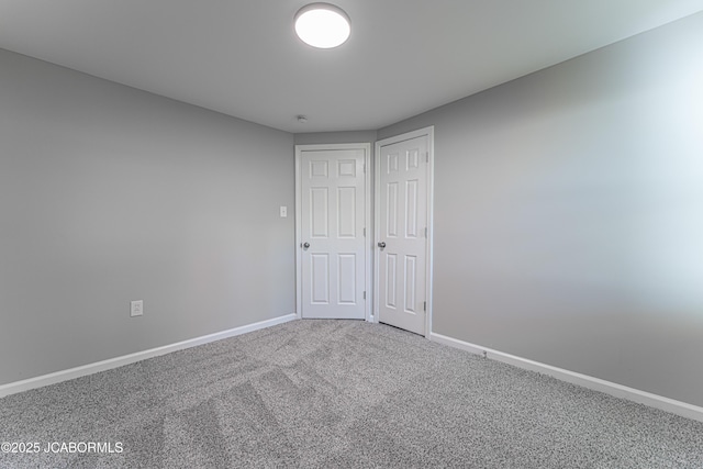 115 Middle St, Moberly, MO 65270 - carpeted spare room featuring baseboards