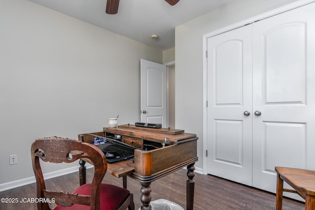 180 Venus St, Holts Summit, MO 65043 - home office featuring dark wood-style flooring, ceiling fan, and baseboards