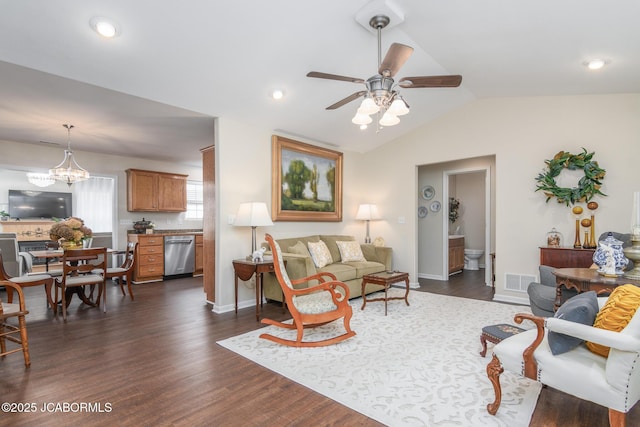 180 Venus St, Holts Summit, MO 65043 - living room with a ceiling fan, lofted ceiling, dark wood-type flooring, baseboards, and a chandelier