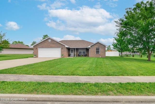 180 Venus St, Holts Summit, MO 65043 - ranch-style home featuring brick siding, an attached garage, and concrete driveway