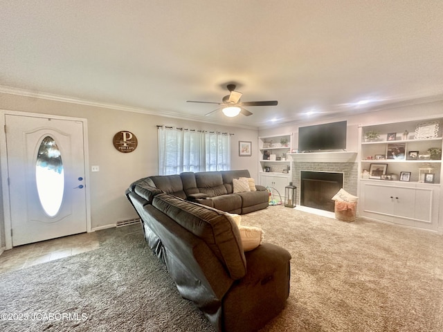 405 Lorene St, California, MO 65018 - carpeted living room featuring crown molding, a ceiling fan, a brick fireplace, and built in shelves