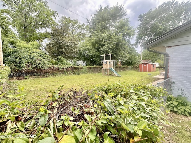 405 Lorene St, California, MO 65018 - view of yard with a playground and a shed