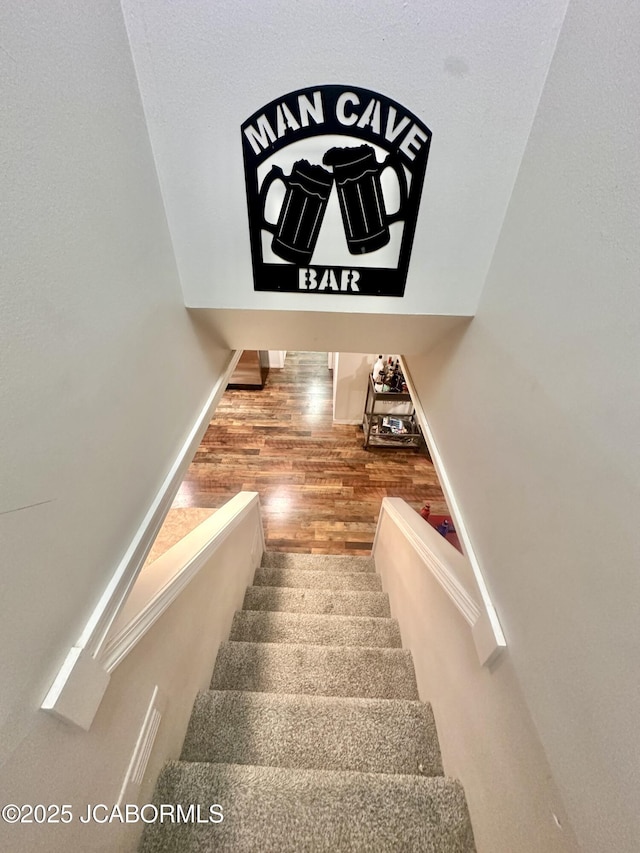 405 Lorene St, California, MO 65018 - stairs featuring wood finished floors and baseboards