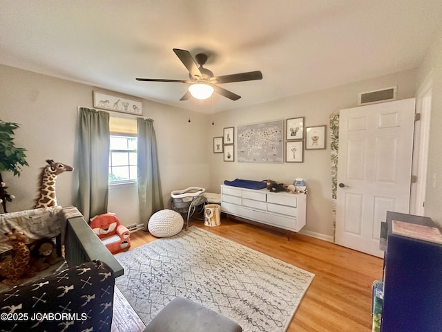 405 Lorene St, California, MO 65018 - bedroom with light wood-style floors and ceiling fan