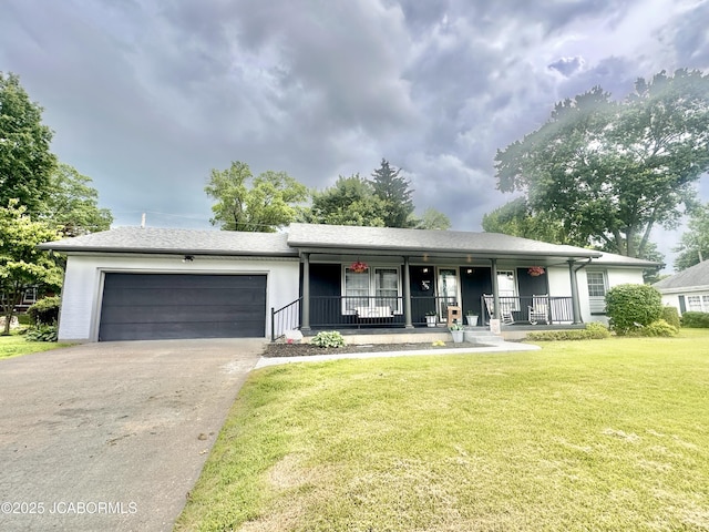 405 Lorene St, California, MO 65018 - ranch-style home featuring a porch, a garage, concrete driveway, a front yard, and stucco siding
