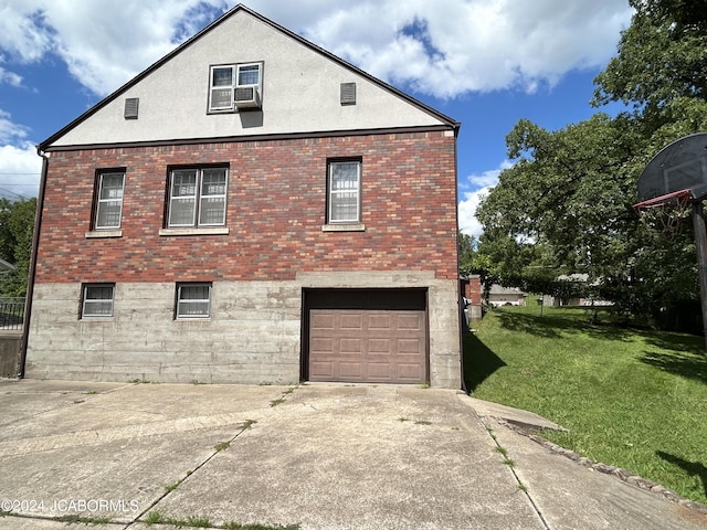 view of property exterior featuring a garage and a lawn