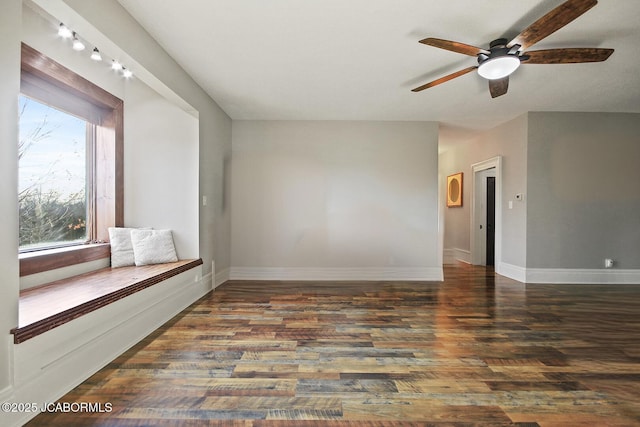 140 County Road 412, Fayette, MO 65248 - empty room featuring ceiling fan, wood finished floors, and baseboards