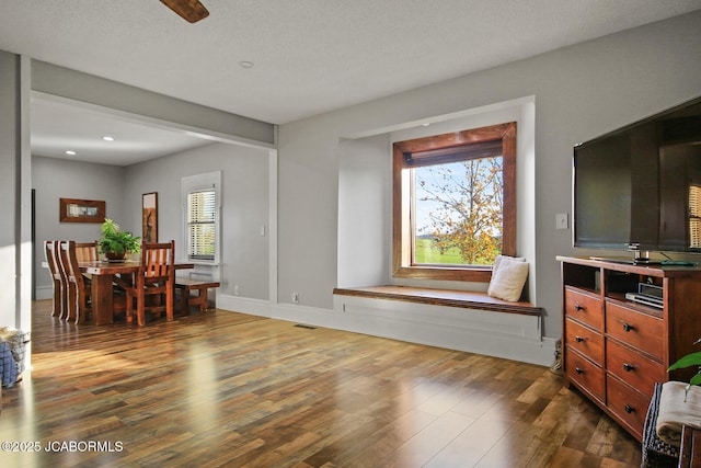 140 County Road 412, Fayette, MO 65248 - living area featuring dark wood finished floors, recessed lighting, and baseboards