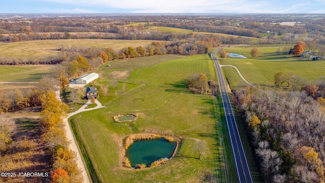 140 County Road 412, Fayette, MO 65248 - aerial view of property's location with a nearby body of water and rural landscape