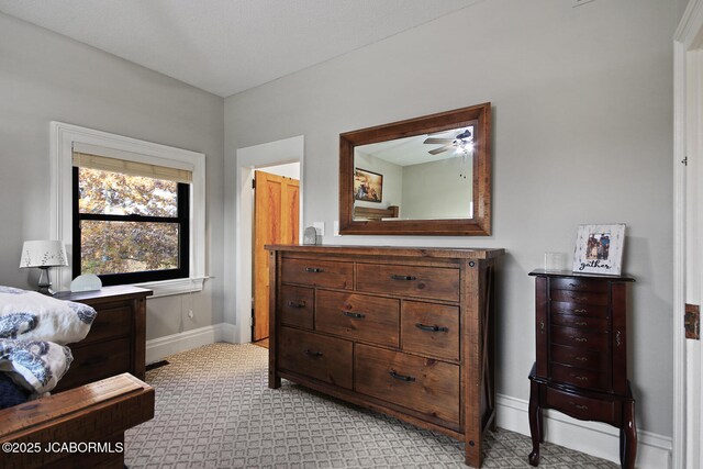 140 County Road 412, Fayette, MO 65248 - bedroom with light carpet and baseboards