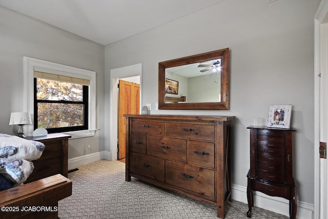 140 County Road 412, Fayette, MO 65248 - bedroom with light carpet and baseboards