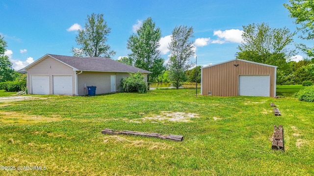 3861 State Road H, Fulton, MO 65251 - view of grassy yard featuring a detached garage and an outdoor structure