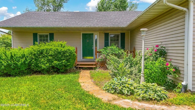 3861 State Road H, Fulton, MO 65251 - view of front of home with a shingled roof and a front lawn
