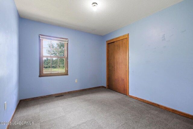3861 State Road H, Fulton, MO 65251 - unfurnished bedroom featuring carpet flooring and a closet