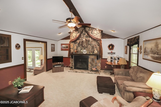 9542 Osage Ct, Williamsburg, MO 63388 - carpeted living area with ceiling fan and a stone fireplace
