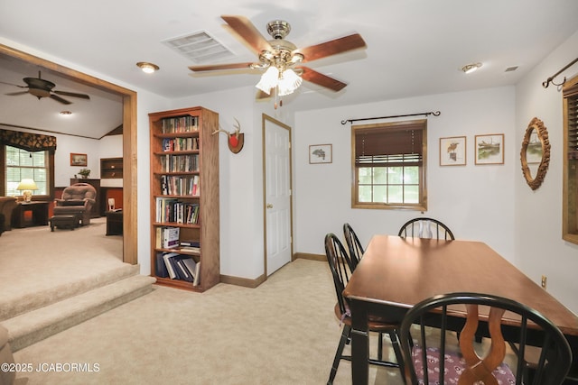 9542 Osage Ct, Williamsburg, MO 63388 - dining area with a ceiling fan and light carpet