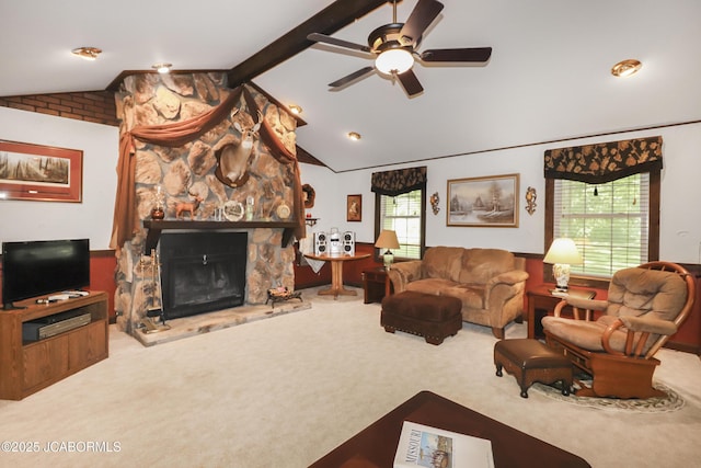 9542 Osage Ct, Williamsburg, MO 63388 - living room with carpet floors, a ceiling fan, and a fireplace