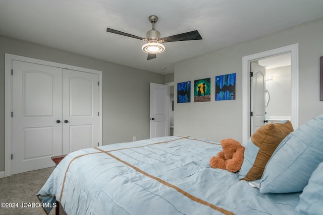 carpeted bedroom featuring ceiling fan and a closet