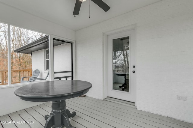 wooden terrace with ceiling fan