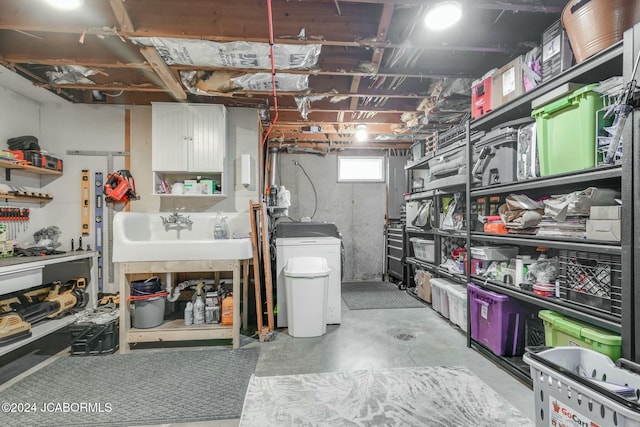 interior space featuring washer / dryer and sink