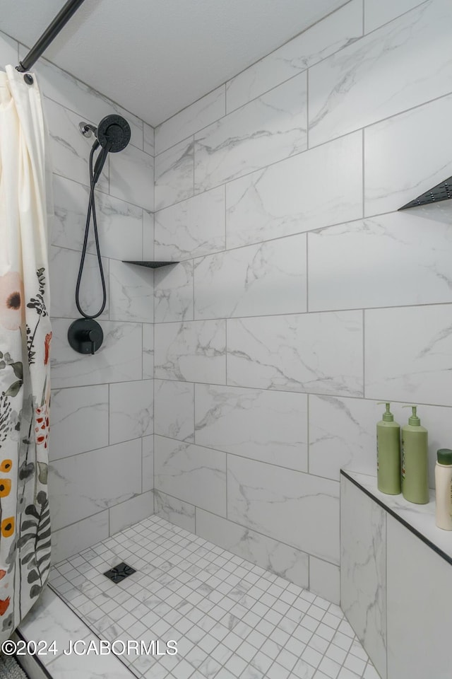 bathroom featuring walk in shower